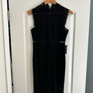 New with tags. Never worn black dress still available at Nordstrom full price.